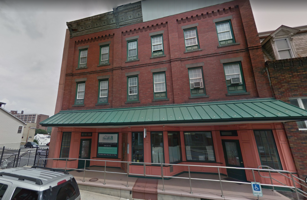 Streetview image of Schuylkill Community Health Center. The building is made of red brick