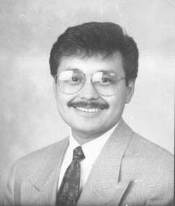 Headshot of Doctor of Dental Medicine, Alfredo Manalo