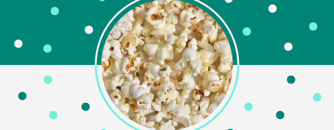 Photo of popcorn pieces on a green and white background and text "Salted Chocolate Popcorn Mix"