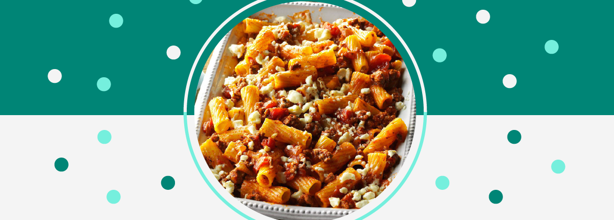 Tasty pasta dish with rigatoni pasta, cheese, and tomato sauce