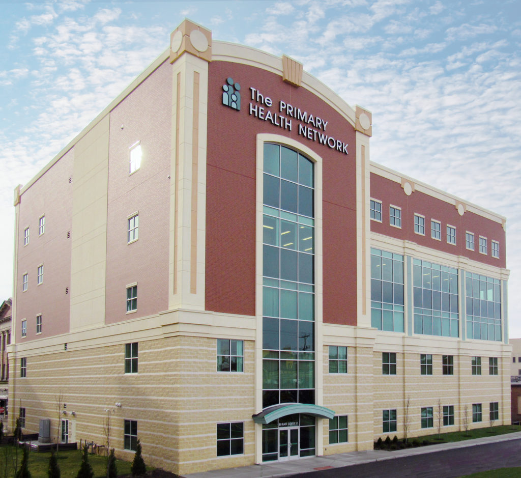 Front entrance view of tall, square Sharon Medical Group Family Medicine building in Pennsylvania