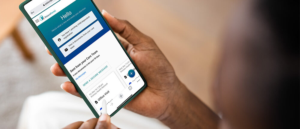 Person holding phone logged into PHN Patient Portal