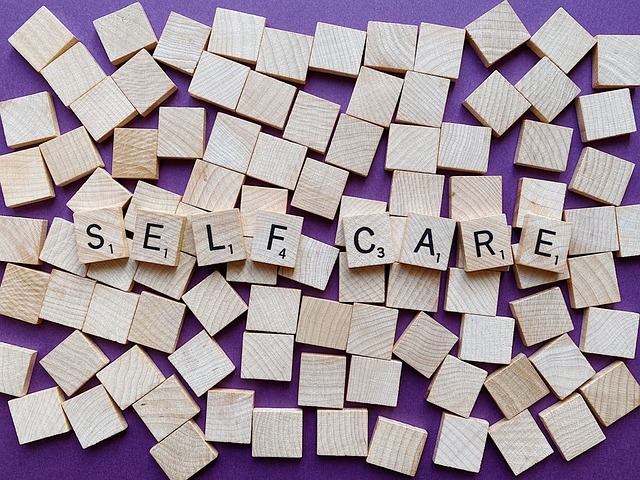 Self-care spelt out with scrabble tiles