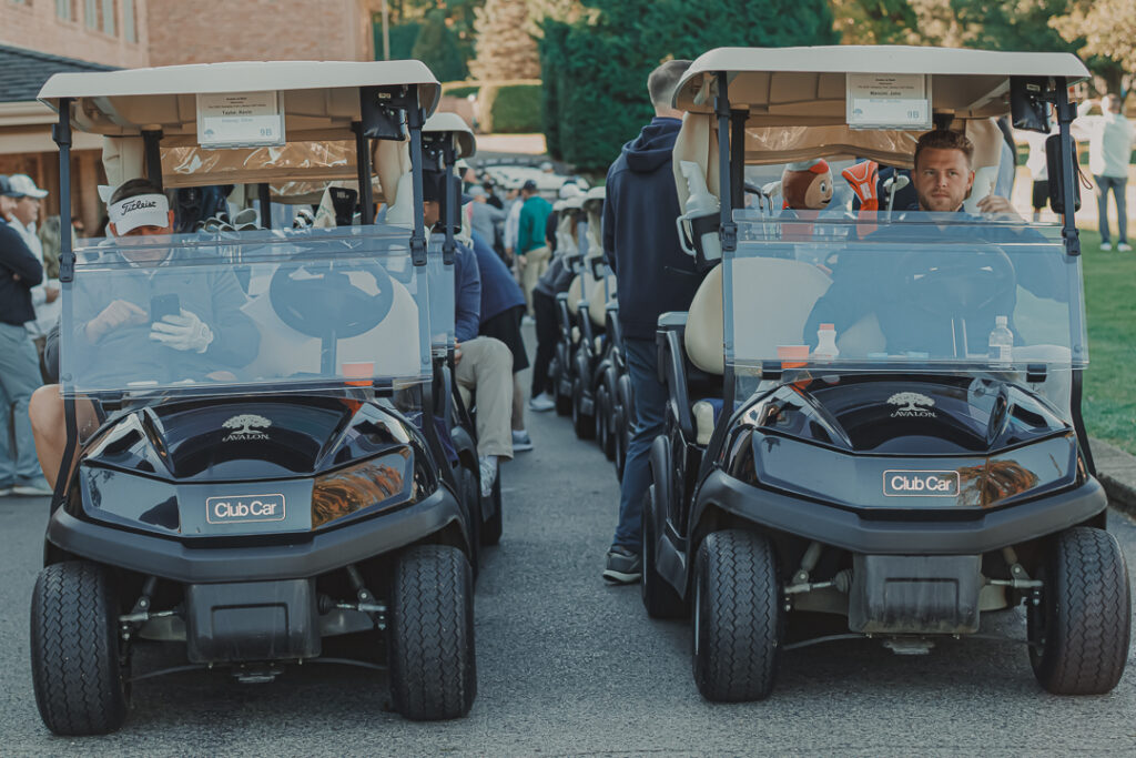 Two golf carts waiting to start