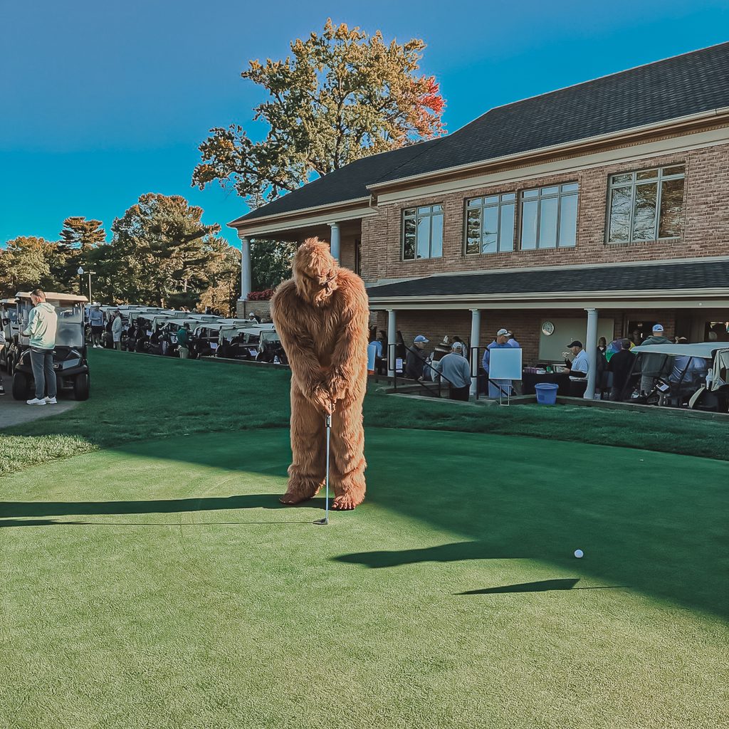The Sharon Sasquatch putting at the practice green