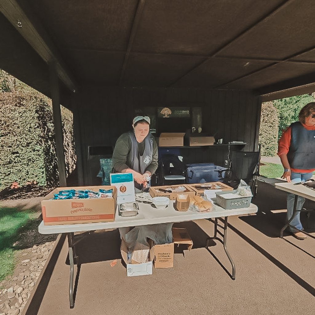 One female volunteer preparing food